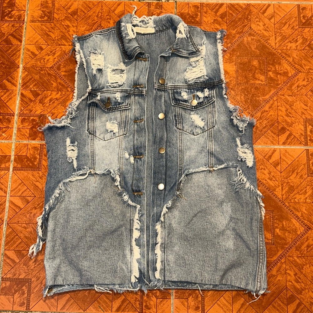 Distressed women’s denim vest